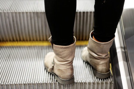 boots, pants, escalator, subway