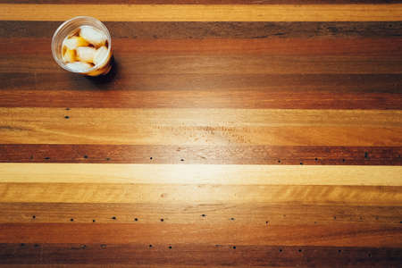 wood, table, plastic, cup, ice, drink, beverage