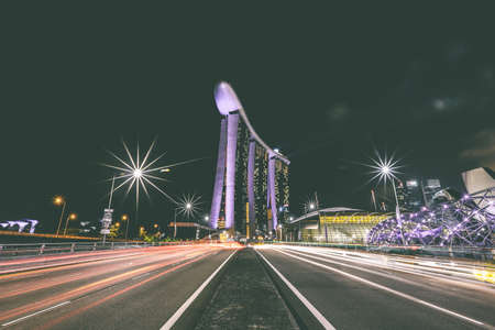 building, architecture, night, lights, road, street, dark, lamp posts, urban