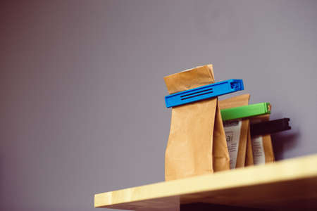 tea, paper bags, clips, shelf