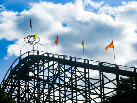 rollercoaster, amusement park, fun, ride, flags, sky, clouds, sunshine, silhouette, shadow