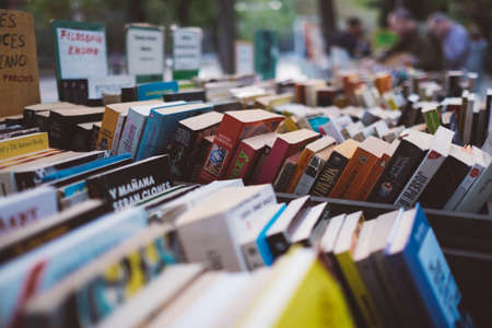 books, softbound, piles, still, bokeh