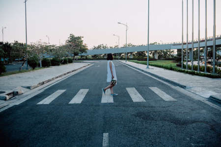 woman, girl, lady, people, walk, sidewalk, street, pedestrian, lane, path, style, fashion, lamp,...