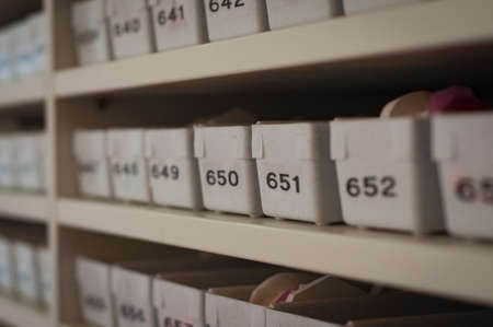 containers, bins, numbers, labels, stacks, shelves, perspective, white, bokeh, still, store, retail