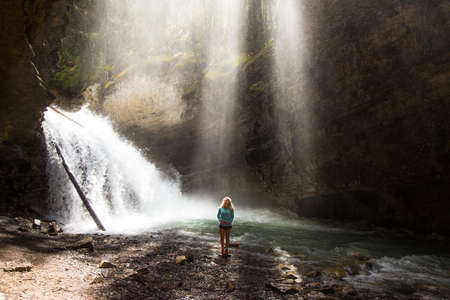 woman, girl, lady, people, stand, nature, water, waterfalls, lake, stream, splash, cave, rocks,...