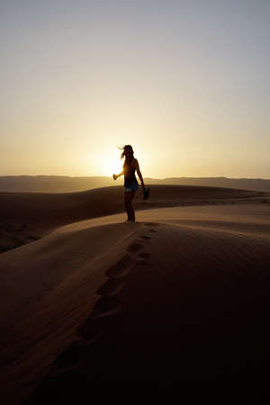 woman, girl, lady, people, stand, desert, dusk, dawn, sunset, sunrise, silhouette, light, shadows,...