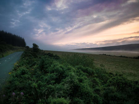 nature, roads, paths, dirt, soil, bushes, plants, grass, view, mountains, sky, clouds, fog, horizon