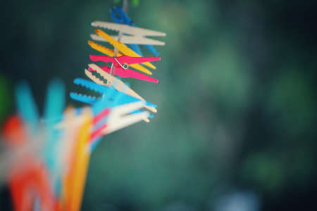 clothes pins, clothes line, laundry, yard, outdoors, clothing