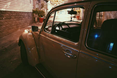 car, park, alley, outside, house, flower, pot, plant, wall