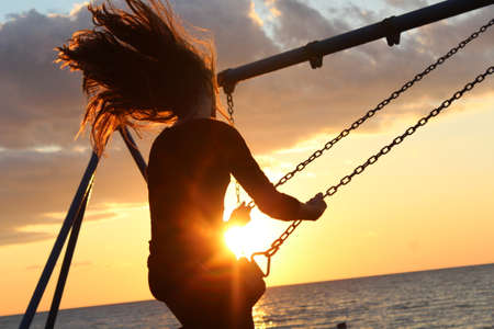 sunlight, sunset, girl, hair, people, wind, seesaw, play, relax, beach, sea, water, nature, clouds,...