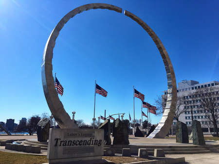landmark, park, arch, town, flag, pole, trees, building, structure, blue, sky