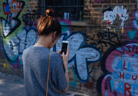 people, woman, cellphone, phone, iphone, mobile, graffiti, picture, wall, paint, art