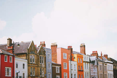 building, architecture, pole, light, bulb, window, wall, sky, clouds