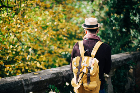 people, man, bag, cap, hat, clothing, balcony, tree, plant, autumn, fall, blur, bokeh, travel,...