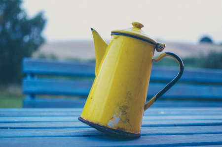 table, bench, yellow, kettle, thermos, blur