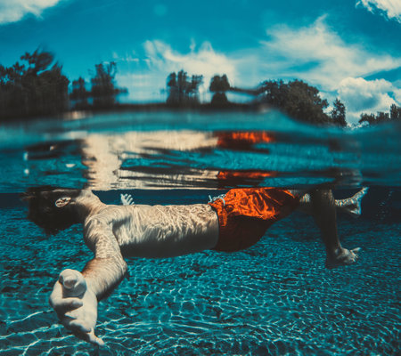 people, man, swimming, water, pool, tree, sky, blue, clouds