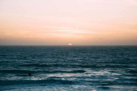sea, water, ocean, wave, horizon, sunset, sunrise, mountain, sky, clouds