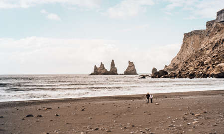 people, man, woman, vacation, beach, shore, coast, sea, water, ocean, waves, hill, mountain, sky,...