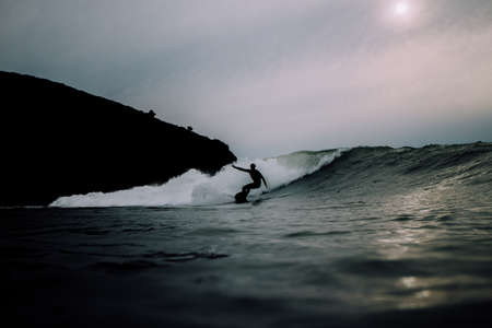 sea, ocean, water, waves, nature, surfing, people, man, dark, silhouette, rock, cliff, sky