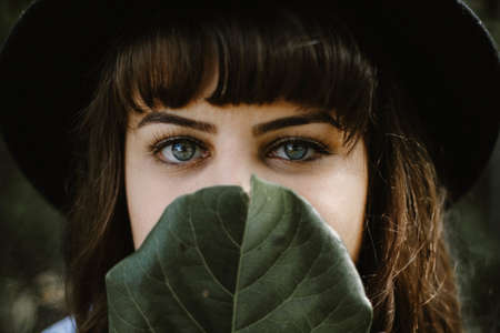 green, leaf, people, girl, woman, face, eyes, eyebrow, hair, black, hat, beauty
