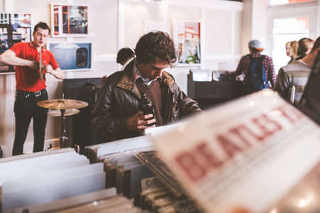 people, men, women, music, store, musical, instrument, magazine, drums, set