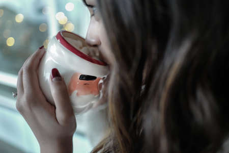 people, woman, girl, female, mug, drink, hand, ring, hair, bokeh