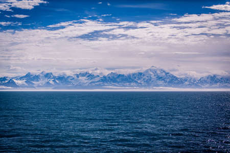 sea, ocean, blue, water, nature, horizon, mountain, highland, cloud, sky, summit, valley