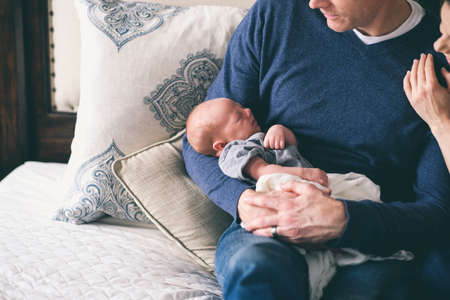 people, father, mother, parents, baby, sofa, couch, sleep, couple, married, pillow, cute, happy