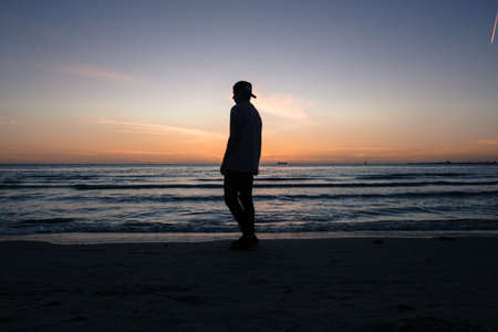 people, man, alone, silhouette, beach, sea, ocean, wave, water, sunset, cloud, sky, horizon