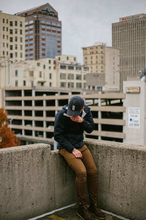 people, man, fashion, rooftop, building, establishment, condominium, hotel, carpark, urban, city