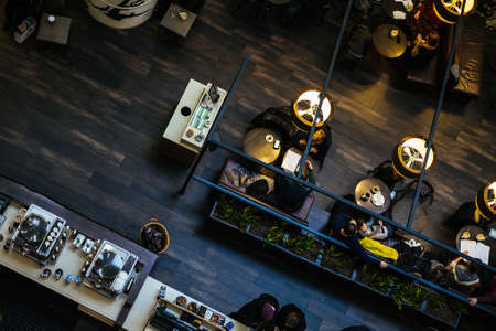 people, restaurant, coffee, shop, socialize, chill, relax, cafe, bartender, chair, table, lamp,...