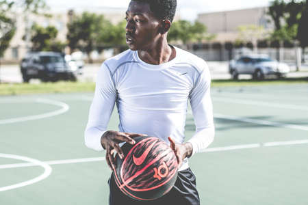 people, ball, nike, guy, man, player, field, black, african american, car, vehicle, blur, trees,...