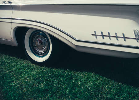 car, vehicle, vintage, grass, door, handle, thing, white, green, wheel, tire