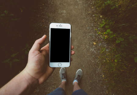 people, man, iphone, cellphone, apple, technology, travel, adventure, trek, nature, floor, leaves,...