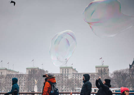 people, bubbles, camera, picture, photography, cold, weather, coat, establishment, building, urban,...