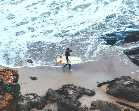 people, man, surf, waves, ocean, sea, beach, vacation, adventure, aerial, rocks, sand