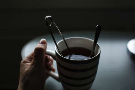 dark, coffee, drink, table, spoon, cup, hand, blur