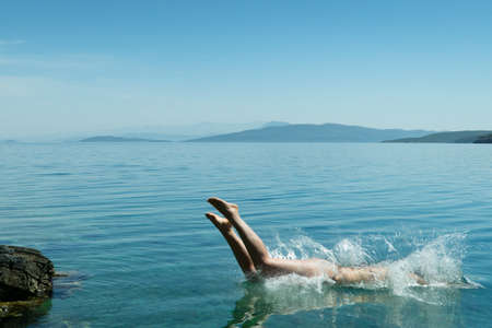 people, woman, swim, hobby, sport, water, ocean, sea, blue, clouds, sky, nature, landscape