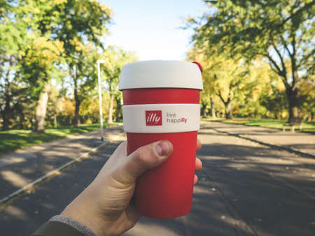 drinks, beverage, hand, coffee, hold, street, shadow, bokeh, outdoor, trees, road, sky