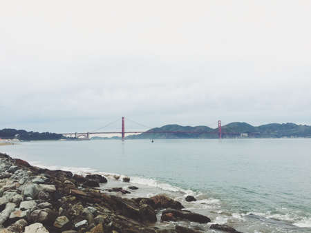 sea, ocean, water, waves, nature, rocks, horizon, blue, sky, clouds, coast, shore, beach, bridge,...