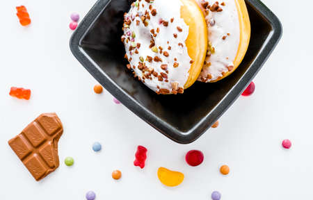 food, dessert, sweet, donut, sprinkles, white, table, plate, delicious, chocolate, glaze