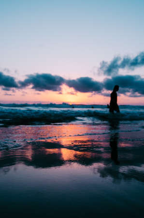 people, walking, silhouette,  sea, ocean, water, wave, reflection, sunset, cloud, sky