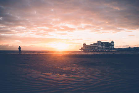 sea, shore, beach, coast, sand, house, horizon, building, people, guy, alone, sunset, view, clouds,...