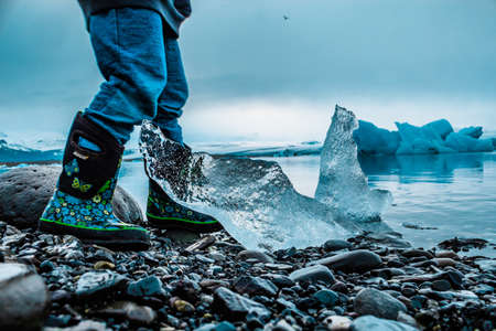 sea, ocean, water, waves, nature, rocks, stone, ice, iceberg, people, travel, boots, snow, winter