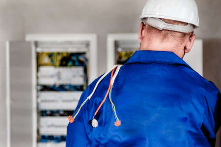 electrician, electricity, wires, cables, worker, hard hat, safety, repairs, construction, building,...