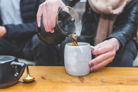 coffeemaker, black, brewed, coffee, drink, mug, cup, spoon, wooden, table, hand, manicure