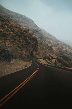 curve,  curved road,  road,  pavement,  montana,  Glacier National Park,  highway,  desert,  dirt, ...