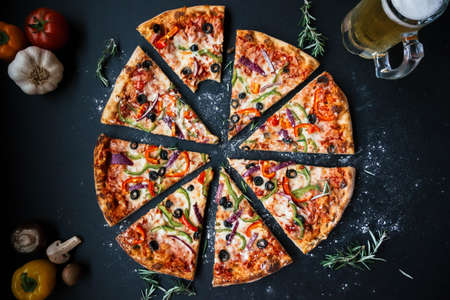 sliced,  homemade,  pizza,  food,  garlic,  beer,  tomatoe,  onion,  black,  table,  olives,  bite