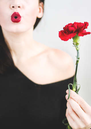 woman,  blowing kiss,  flower,  red,  female,  people,  girl,  black dress,  fashion,  red flower, ...