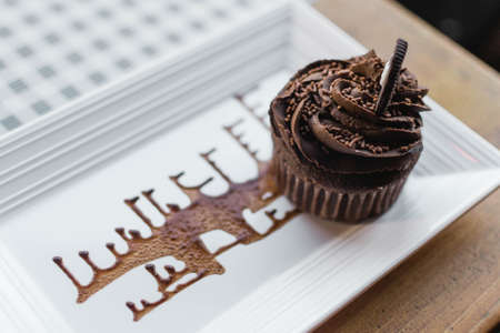 chocolate,  cake,  dessert,  food,  plate,  white,  minimal,  table,  wood,  sauce,  cupcake